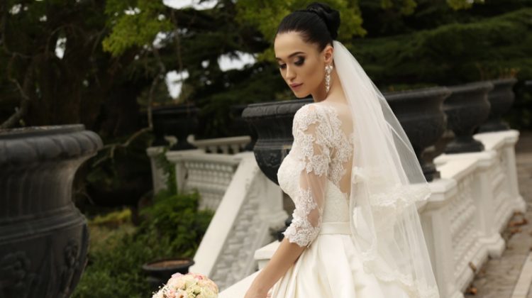 Every Savvy Bride's Essential Wedding Stationery List Model Wedding Dress Lace Veil Brunette