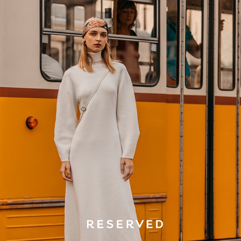 Model Daga Ziober poses in Reserved long-sleeve dress