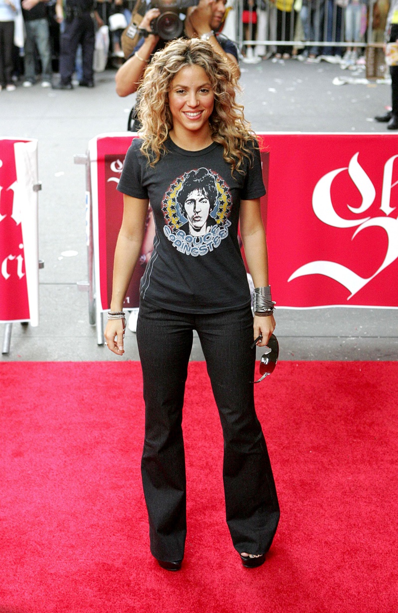 Shakira wearing Bruce Springsteen t-shirt and jeans.