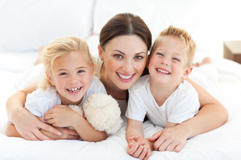 Smiling Mom Children Bed