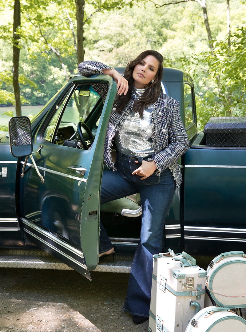 Posing outdoors, Candice Huffine appears in Veronica Beard fall-winter 2019 campaign