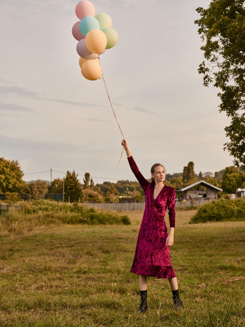 Adrienne Juliger poses with balloons for Beymen fall-winter 2019 campaign