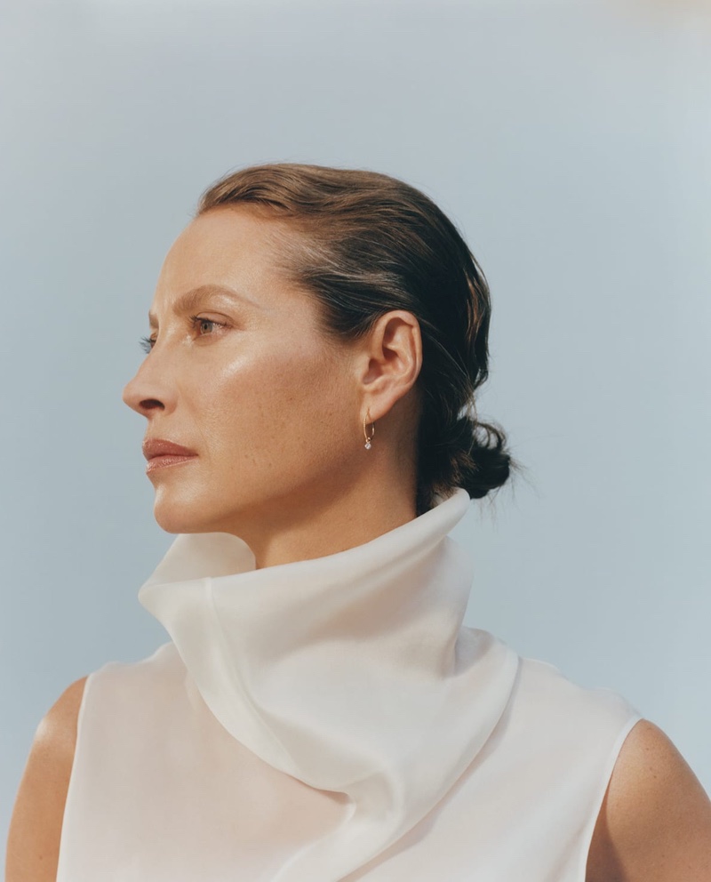 Christy Turlington poses in The Row top and Raphaele Canot earrings for MATCHESFASHION fall-winter 2019 campaign