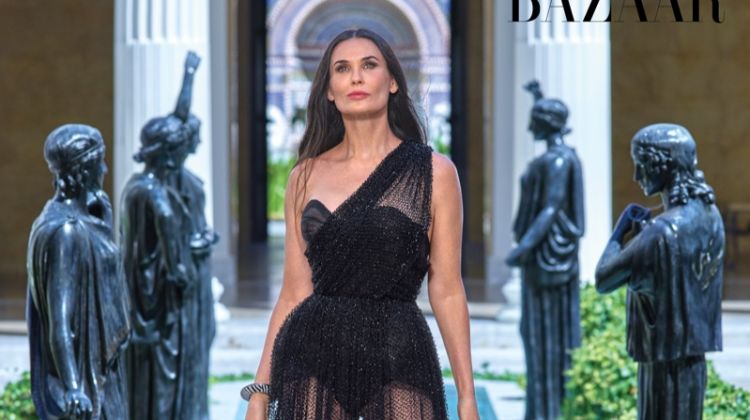 Actress Demi Moore wears Dior Haute Couture dress and Sergio Rossi sandals