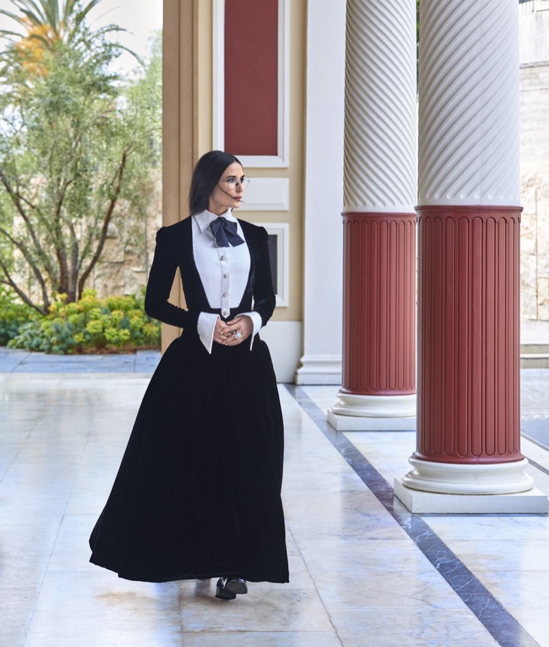 Wearing black and white, Demi Moore poses in Chanel Haute Couture look