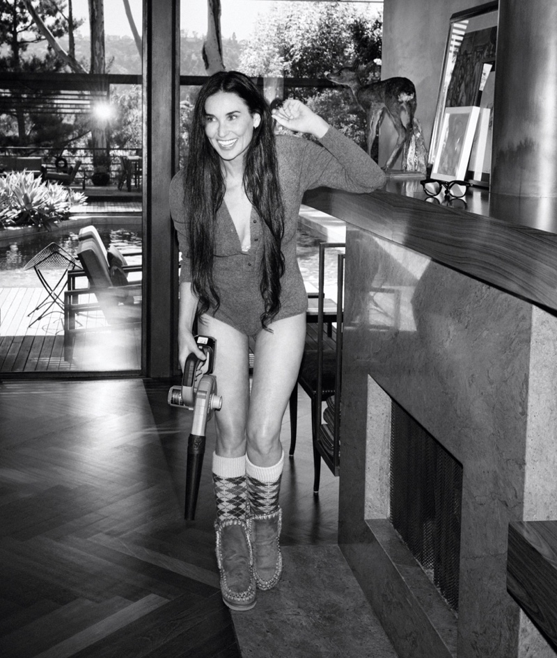 All smiles, Demi Moore wears Eres bodysuit with Gucci socks