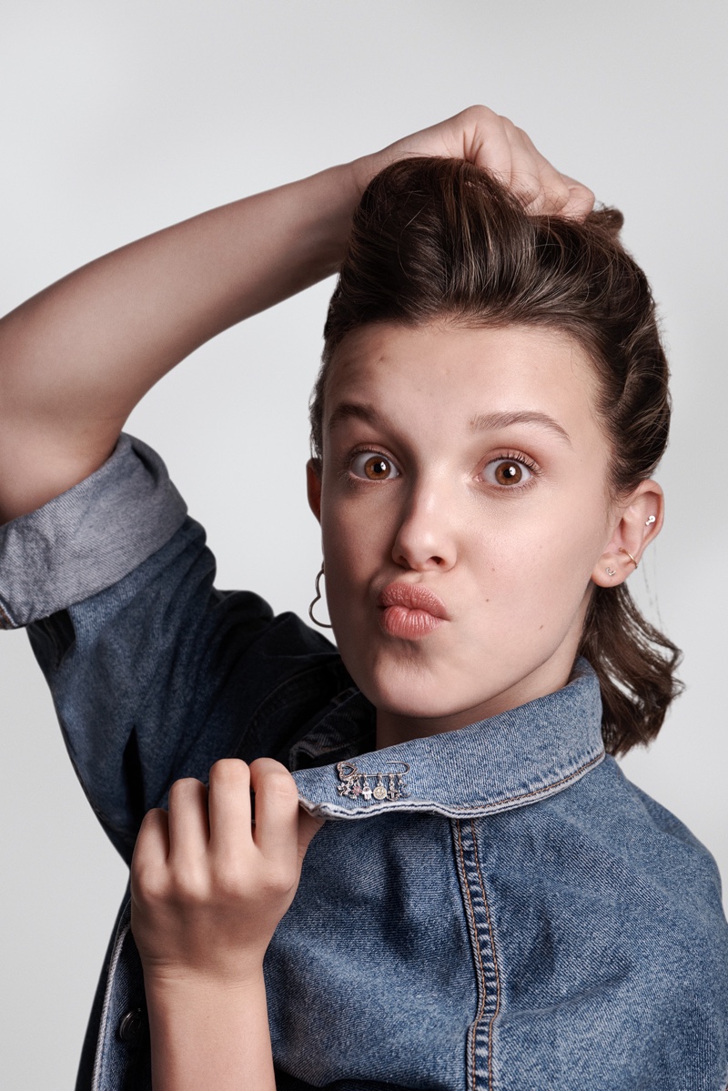 Making a face, Millie Bobby Brown appears in Pandora Me jewelry campaign