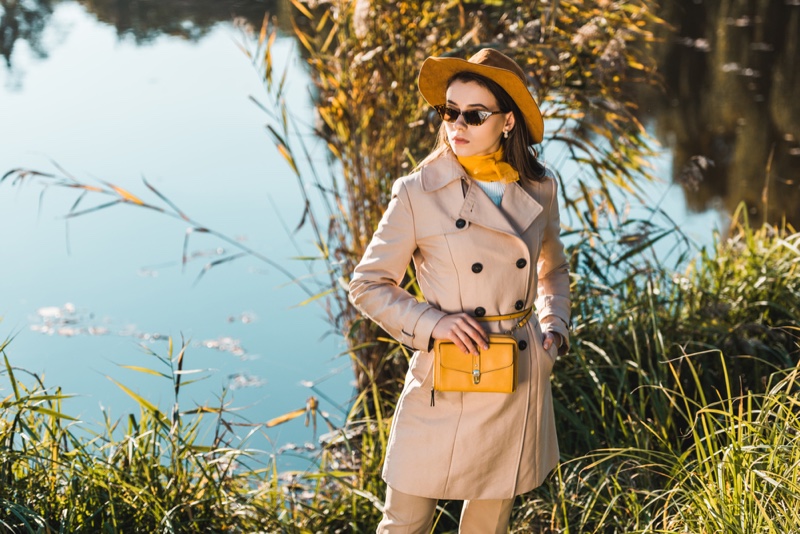 Model Outdoors Trench Coat Tailored Yellow Hat Bag