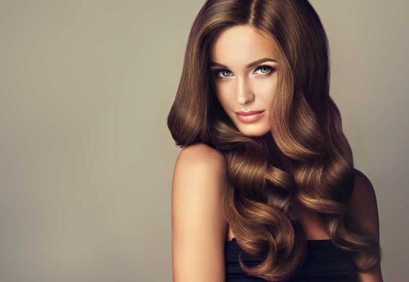 Model Wavy Hairstyle Brunette Highlights