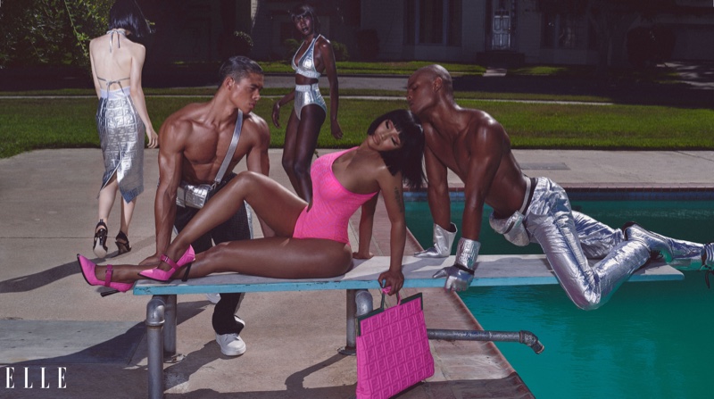 Posing poolside, Nicki Minaj models Fendi Prints On swimsuit in hot pink