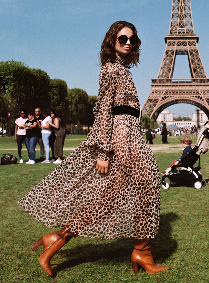 Giselle Norman models Zara animal print dress, over the knee leather boots and tortoiseshell sunglasses