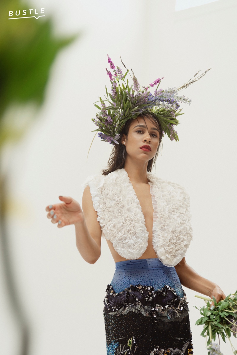 Posing for Bustle, Zawe Ashton wears Mary Katrantzou top, skirt and Pamela Love earrings