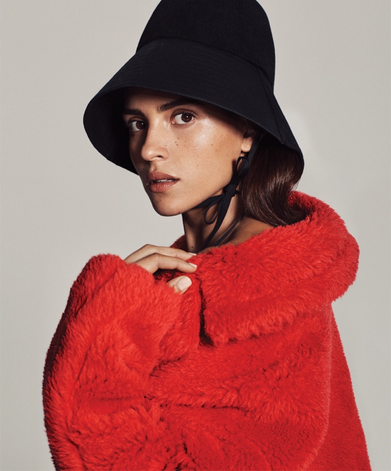 Photographed by Michael Schwartz, Adria Arjona poses for DuJour