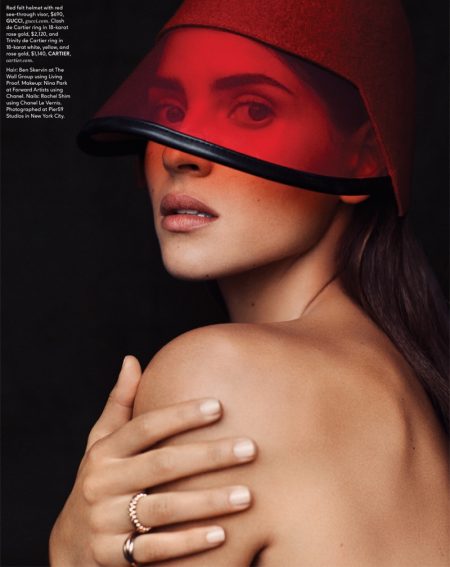 Adria Arjona Poses in Shades of Red for DuJour Ready for her closeup, Adria Arjona wears Gucci visor with Cartier rings