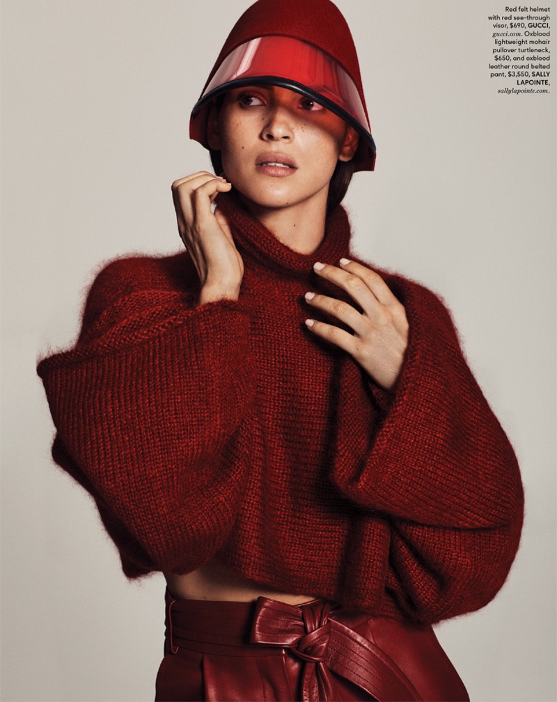 Adria Arjona poses in Gucci visor with Sally LaPointe sweater and trousers