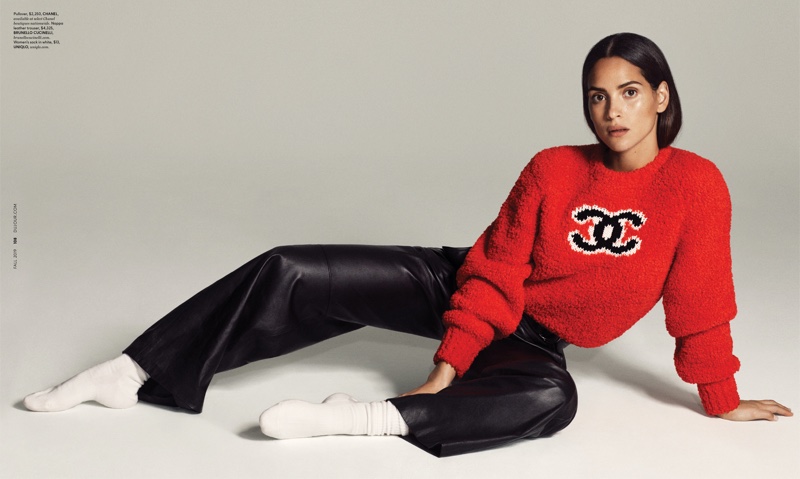 Actress Adria Arjona wears Chanel sweater, Brunello Cucinelli leather pants and Uniqlo socks