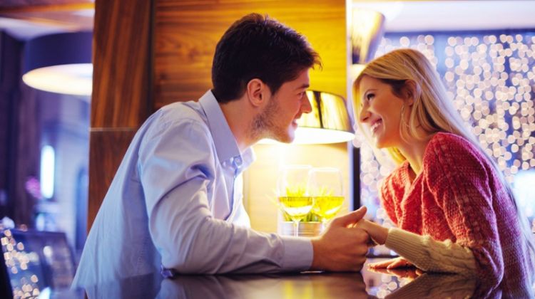 An Interesting Way for Single Londoners to Meet Their Other Halves Attractive Couple Date Holding Hands Table