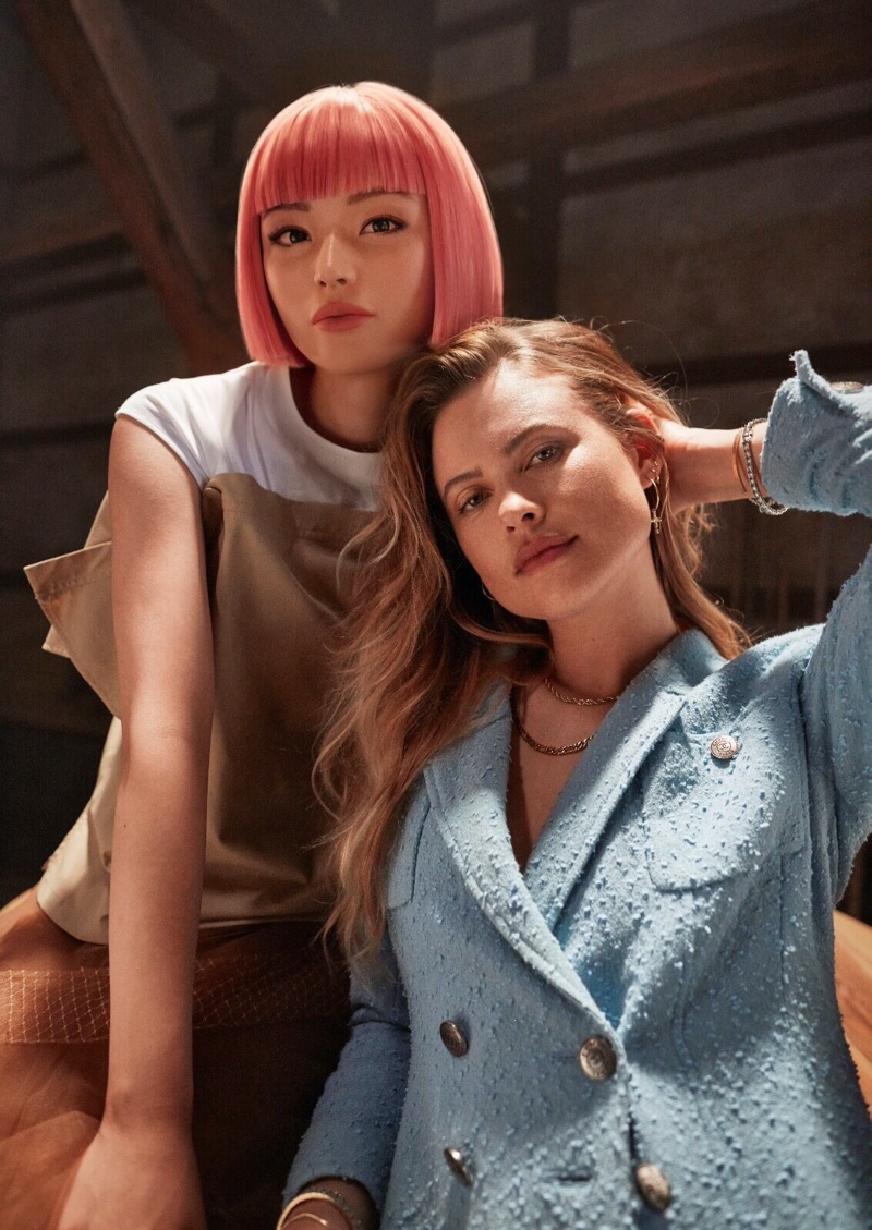 Computer generated star Imma poses with model Behati Prinsloo for SK-II Power of Pitera shoot