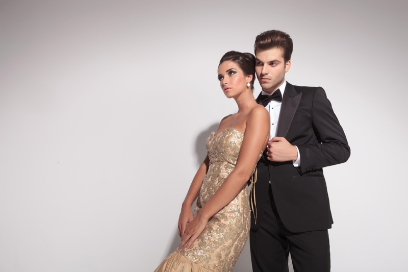 Couple Model Elegant Gold Gown Black Tuxedo