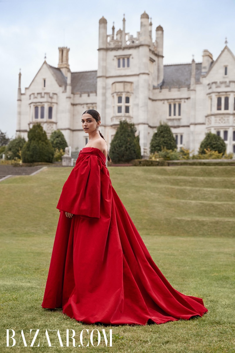 Looking striking in red, Deepika Padukone models Emilia Wickstead gown