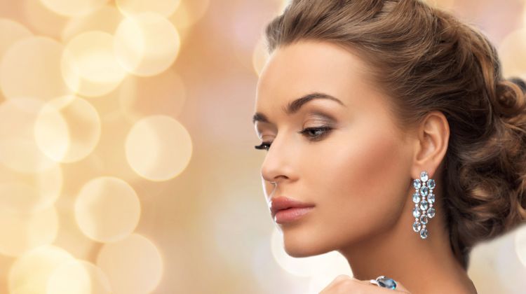 What's the Perfect Attire to Attend a Luxurious Casino? Elegant Woman Earrings Updo