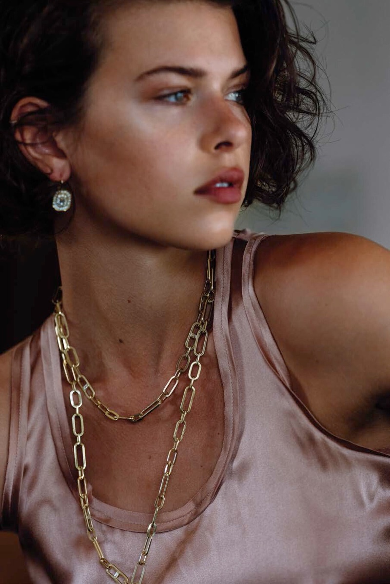 Model Georgia Fowler wears layered necklaces from Penny Preville holiday 2019 collection