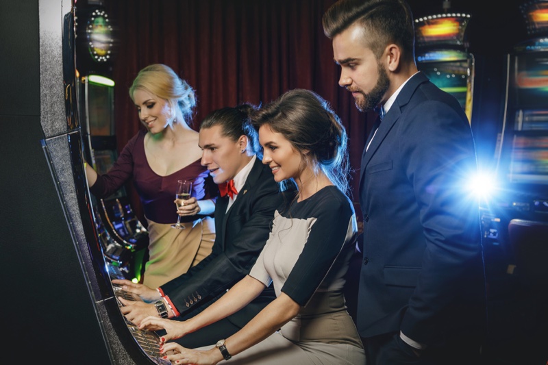 Group Friends Playing Casino Slots