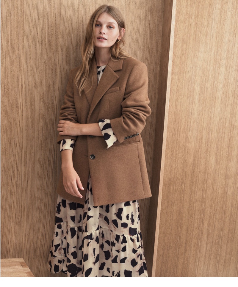 Sofia Mechetner wears H&M short wool-blend coat and patterned silk dress