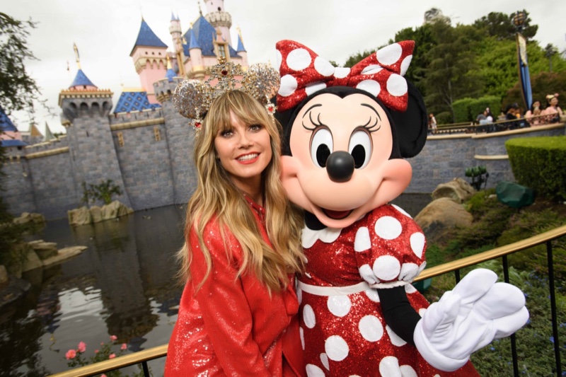 Heidi Klum poses with Minnie Mouse at Disneyland.