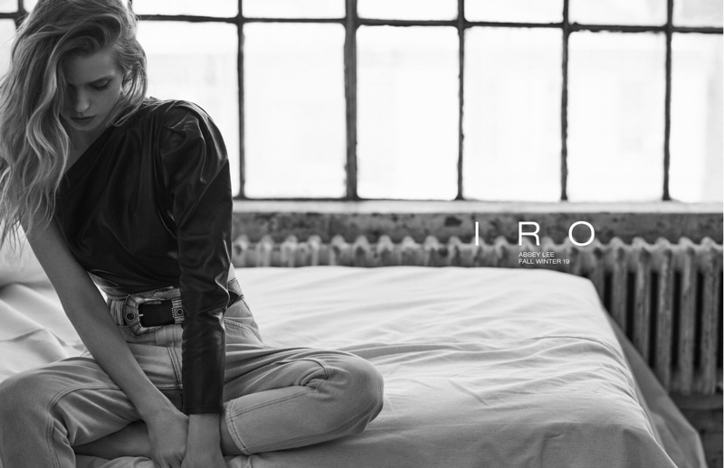 Lounging on bed, Abbey Lee Kershaw poses for IRO fall-winter 2019 campaign