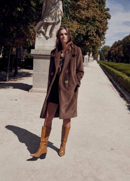 Josephine le Tutour Models 1970's Inspired Outerwear From Mango Josephine le Tutour poses in Mango pocketed faux fur coat