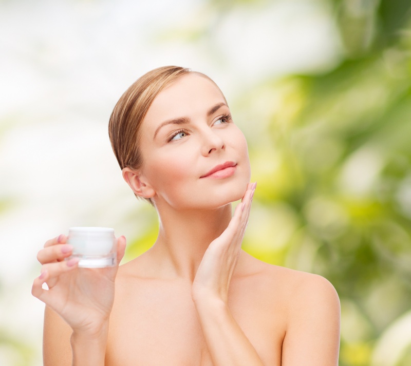 Older Woman Applying Cream Beauty