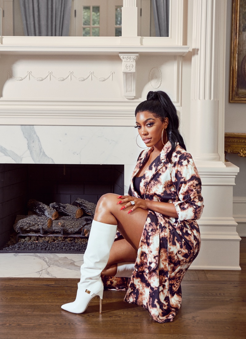 Porsha Williams wears white boots from JustFab collaboration
