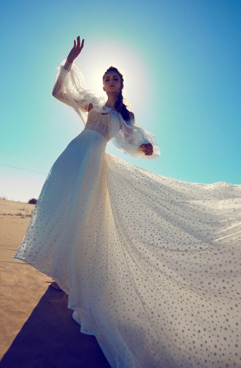 Diana Herasymuk poses in Ramon Herrerias Bridal 2020 Collection