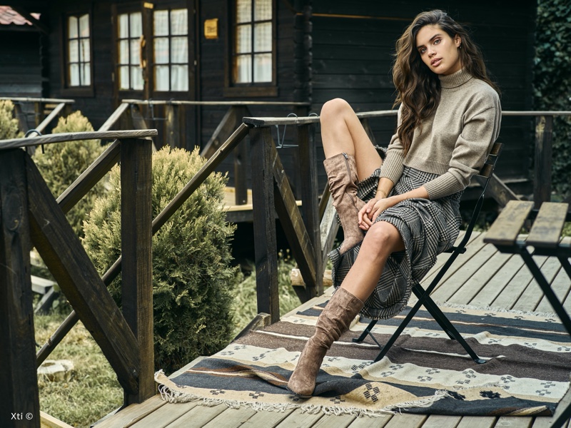 Wearing boots, Sara Sampaio returns for XTI Shoes fall-winter 2019 campaign