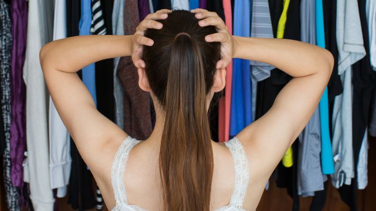 Woman Organizing Closet