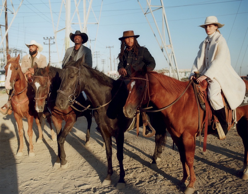 Kris Grikaite poses with cowboys in Zara Coats Collection fall-winter 2019 lookbook