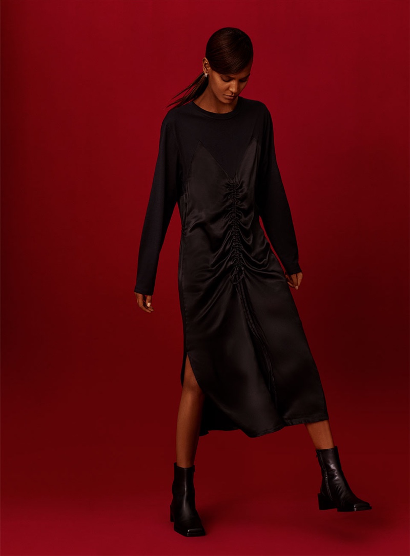 Model Liya Kebede wears Zara contrasting satin dress and leather square toe ankle boots