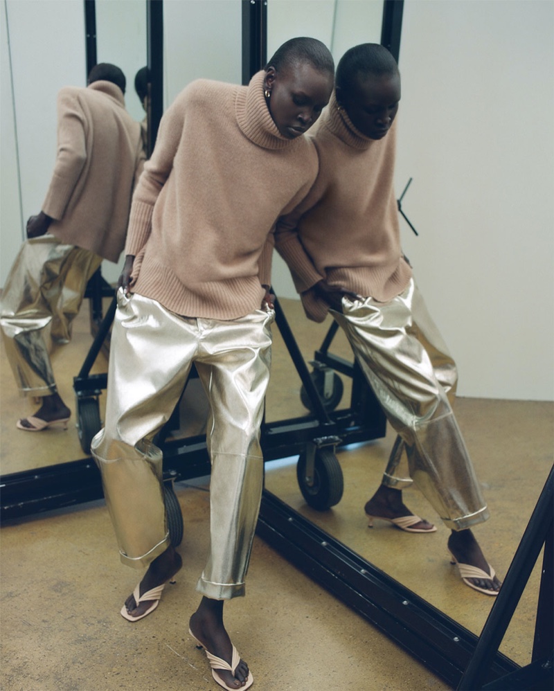 Alek Wek poses in Zara's fall-winter 2019 sweater selection