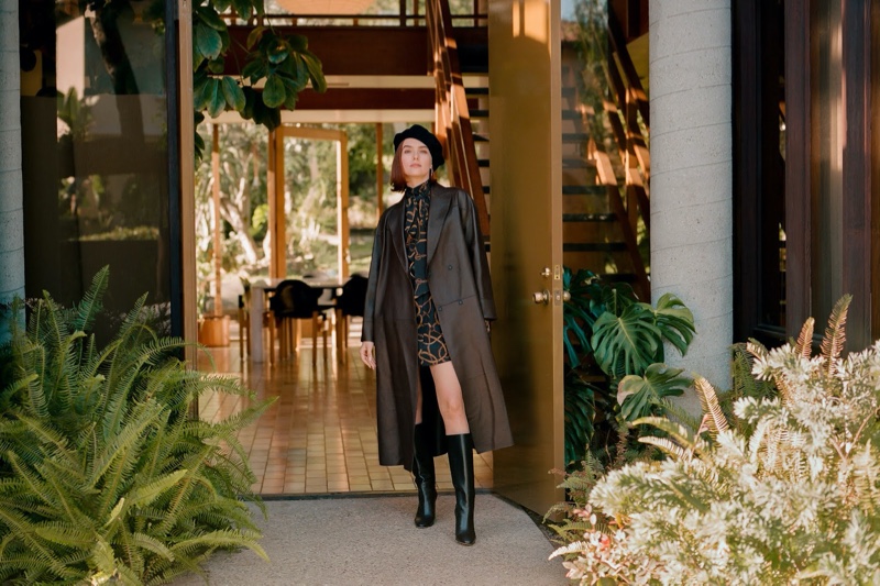 Zoey Deutch models Brunello Cucinelli trench coat, Maison Michel beret, Rokh blouse and Gianvito Rossi boots