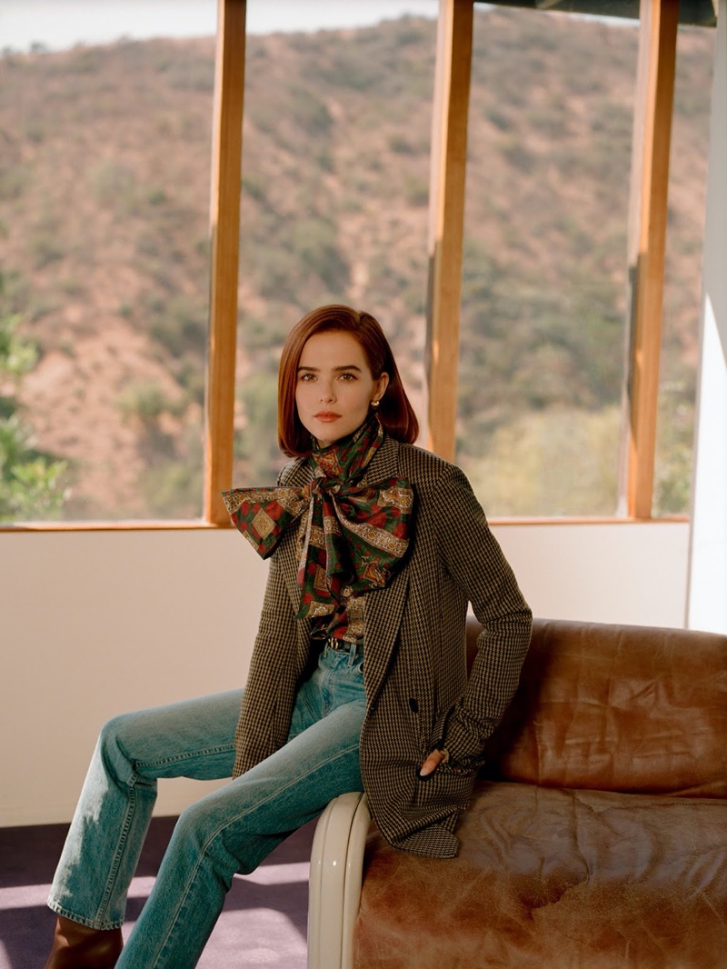 Actress Zoey Deutch poses in Rosetta Getty blazer, Etro blouse and SLVRLAKE jeans