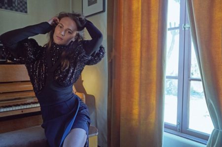 Striking a pose, Alicia Vikander wears Louis Vuitton