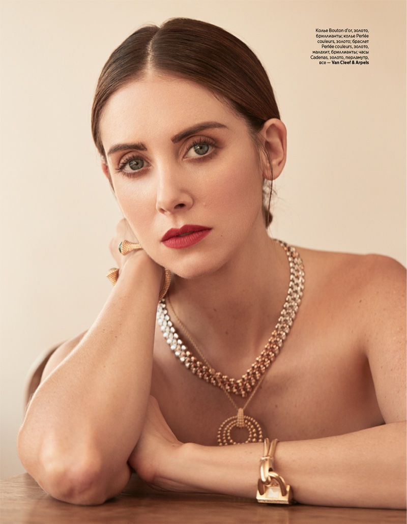 Wearing a red lip, Alison Brie shines in dazzling jewelry from Van Cleefs & Arpels