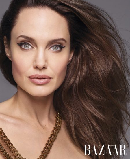 Angelina Jolie Charms in Harper's Bazaar Cover Story Ready for her closeup, Angelina Jolie poses in Oscar de la Renta dress