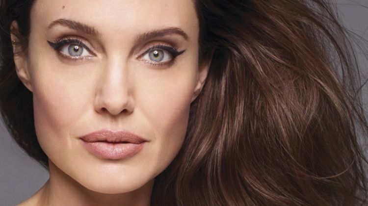 Ready for her closeup, Angelina Jolie poses in Oscar de la Renta dress