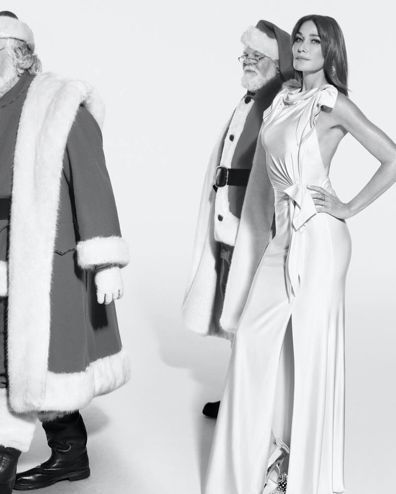 Carla Bruni poses with Santas in Burberry Holiday 2019 campaign