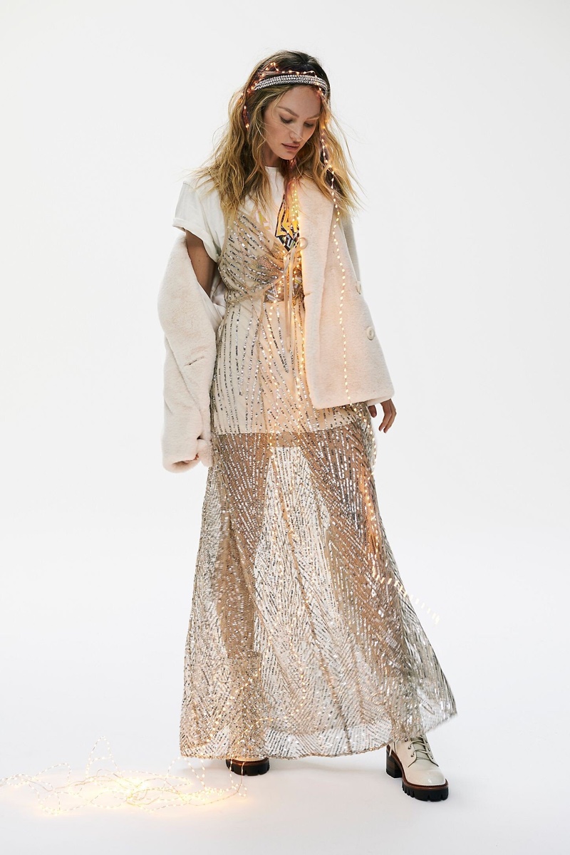 Model Candice Swanepoel wears Intimately Free People Sparks Fly embellished maxi slip dress