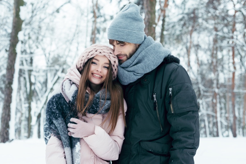 Couple Outdoors Snow Smiling Jackets Hats