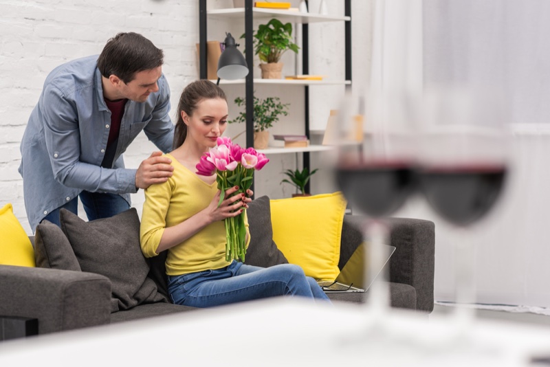 Couple Woman Holding Flowers Gift