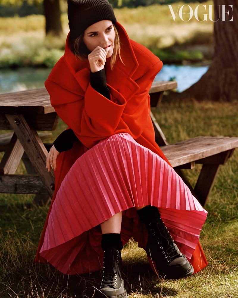 Emma Watson tries on Balenciaga coat and skirt, Gabriela Hearst sweater and Alexander McQueen boots